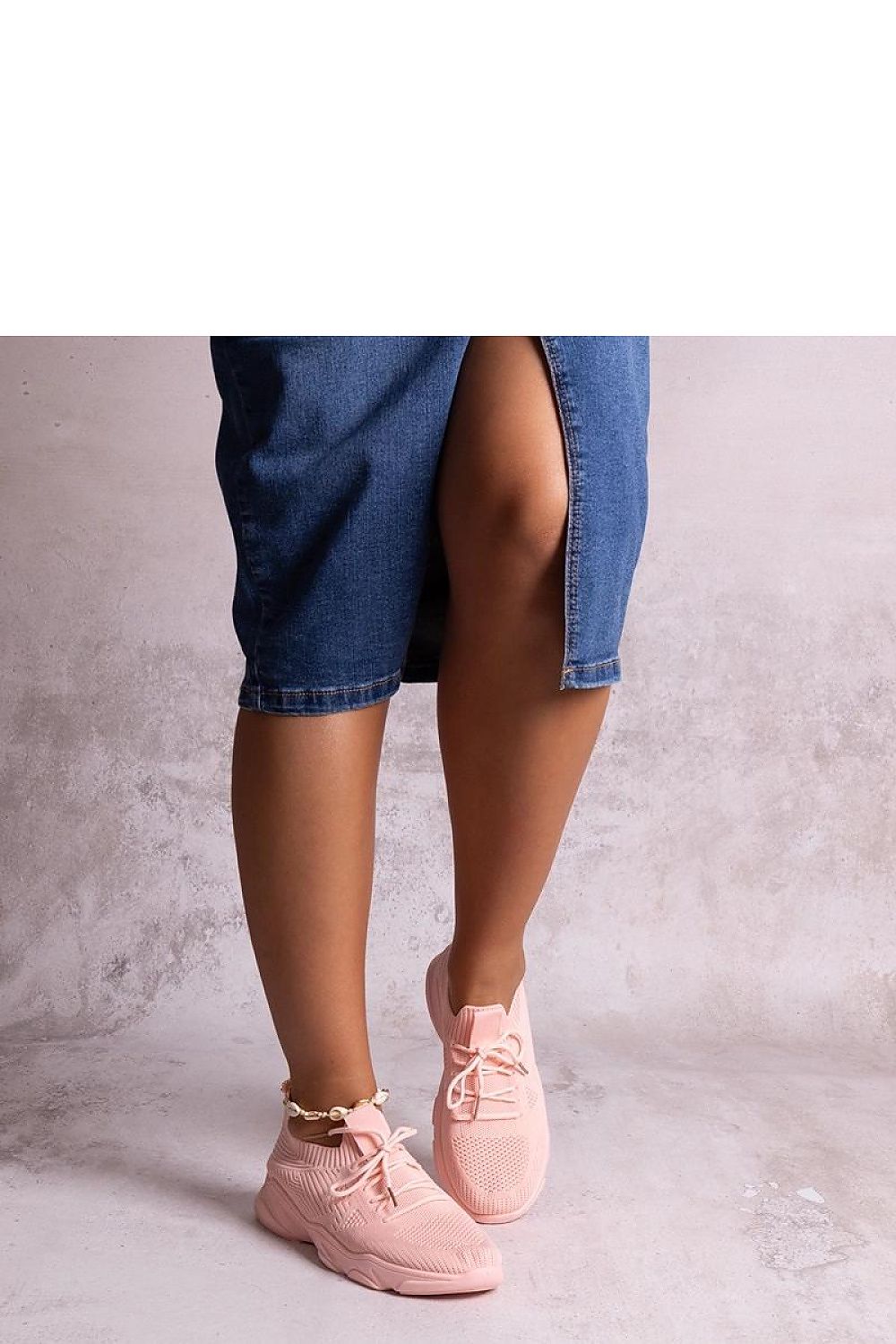 Solea beige fabric sneakers on a fashionable background, designed for comfort and elegance for the modern woman.