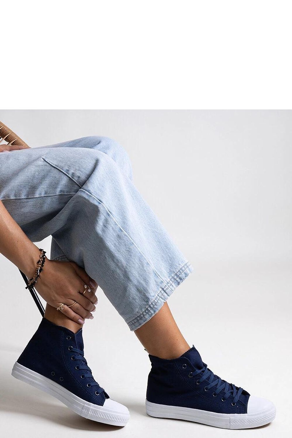 Luxurious Solea navy high-top sneakers showcasing stylish brown sole, designed for comfort and elegance in EU sizes 36 to 41.