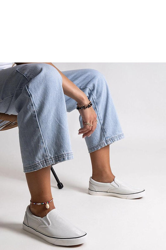 Close-up of Solea White Shiny Sneakers Lublubah, highlighting the high-quality rubber sole and chic, contemporary design.