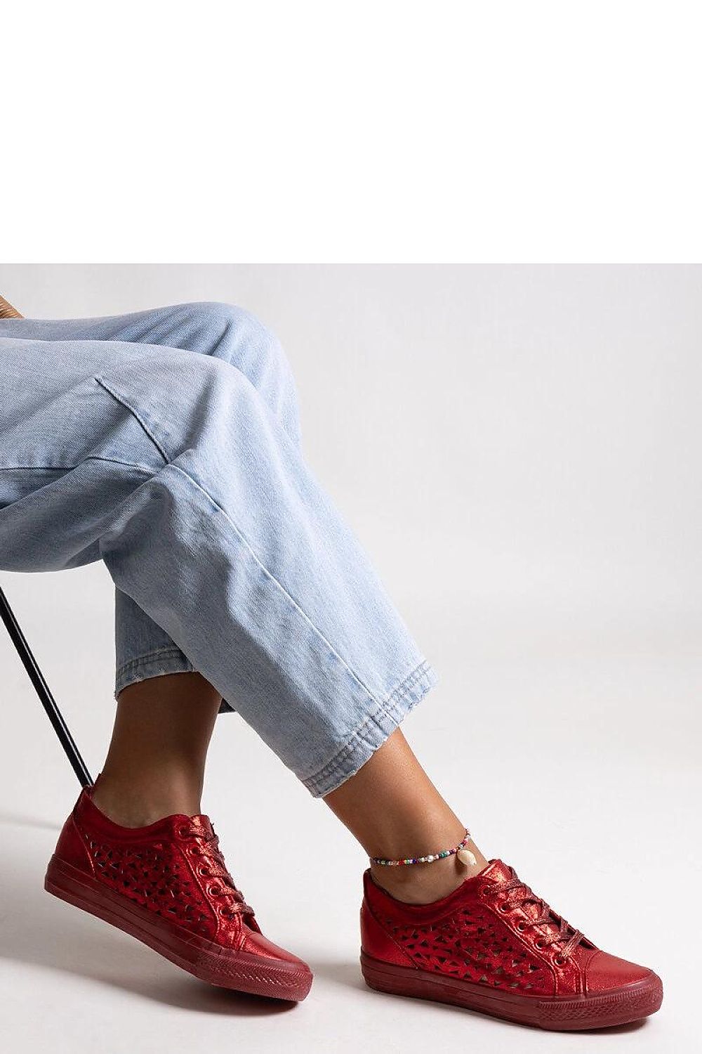 Solea luxurious black high-top sneakers showcasing a modern design with metallic accents, ideal for fashionable summer outings.