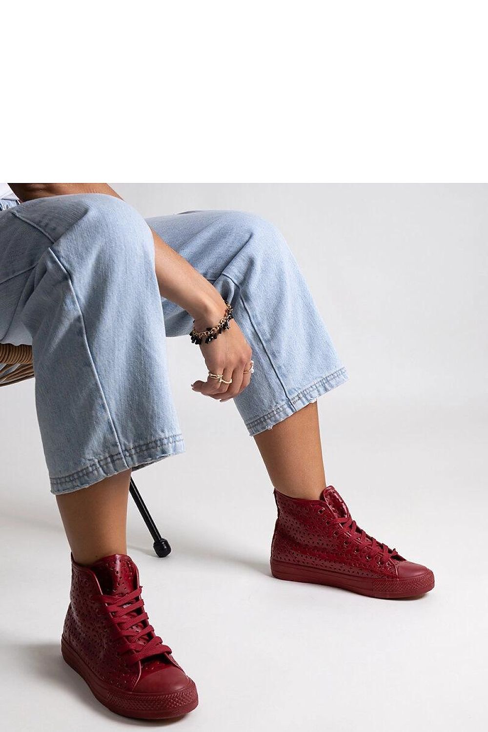 Side view of Solea Red High-Top Lace-Up Sneakers, combining comfort and trendy aesthetics for the modern urbanite.