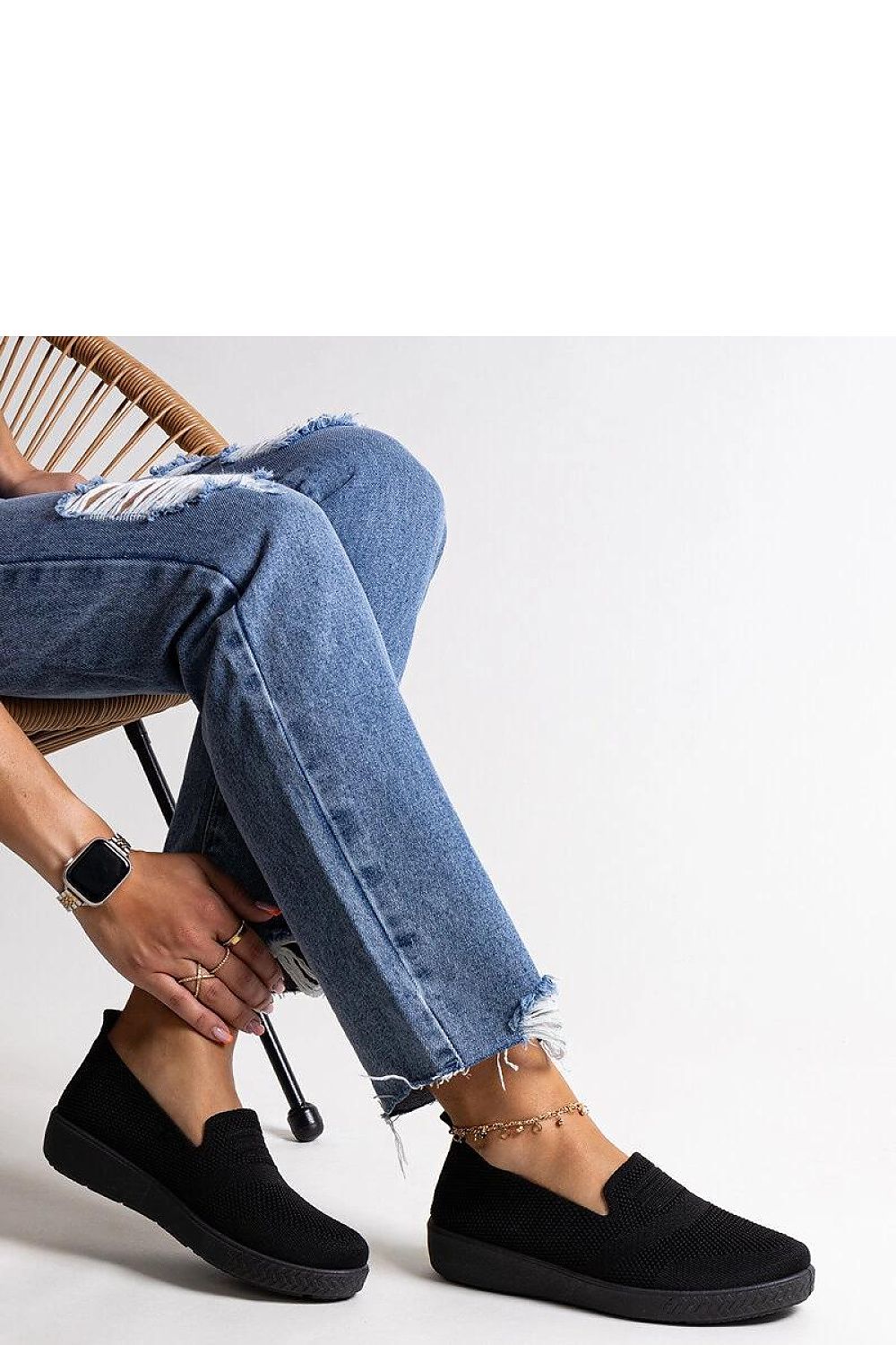 Solea Luxury Black Slip-On Sneakers for Summer, elegantly designed and comfortable footwear for warm days, showcasing a fashionable low profile made of durable elastic rubber.