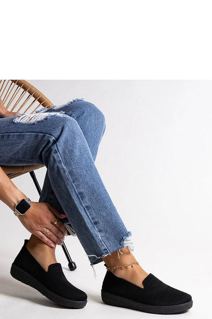 Solea Luxury Black Slip-On Sneakers for Summer, elegantly designed and comfortable footwear for warm days, showcasing a fashionable low profile made of durable elastic rubber.