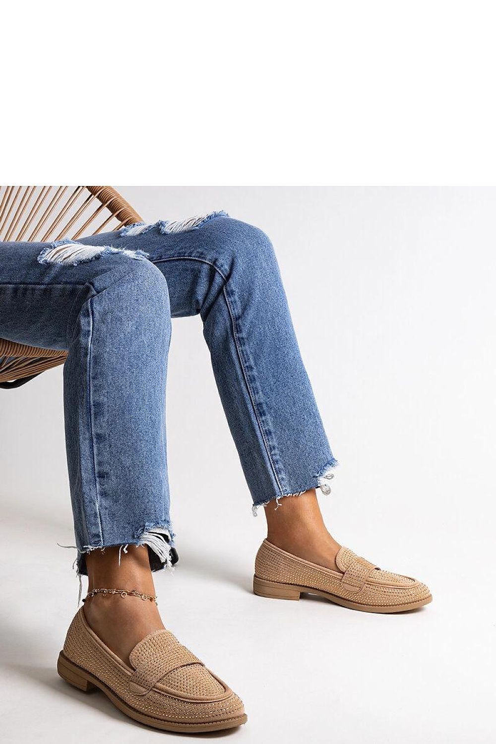 Solea Brown Eco-Leather Loafers laid against a soft backdrop, highlighting the smooth eco-leather and fashionable slip-on style suitable for warm weather.