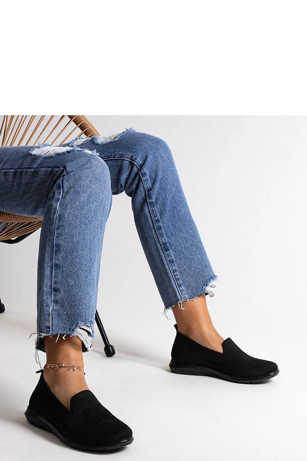 Close-up of Solea men's breathable black sneakers with a foam sole, showcasing their modern almond toe design.