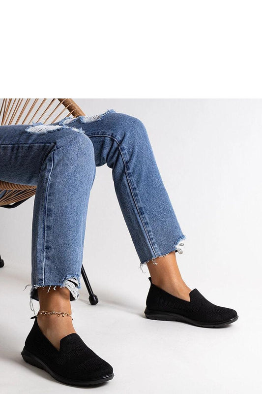 Close-up of Solea men's breathable black sneakers with a foam sole, showcasing their modern almond toe design.