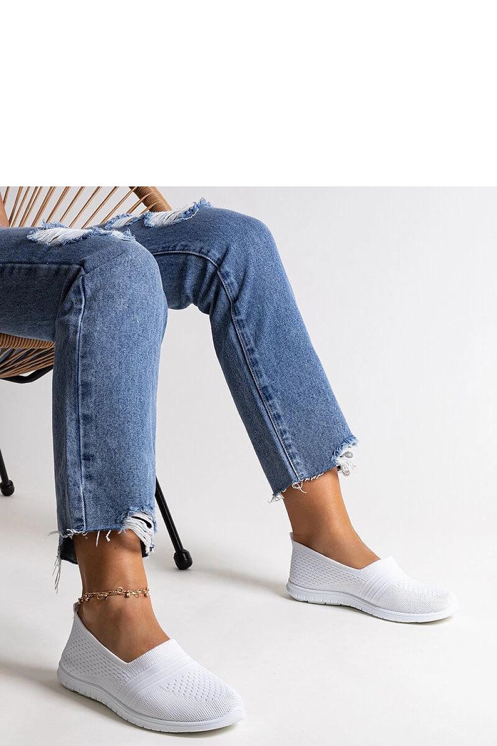 Solea White Slip-On Sneakers for Women showcasing a modern minimalist design, perfect for summer casual comfort, featuring a low profile and rubber sole.