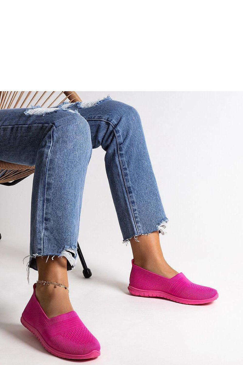 Model wearing Solea Dark Pink Slip-On Sneakers Shalha, demonstrating their stylish fit and versatility for casual summer looks.