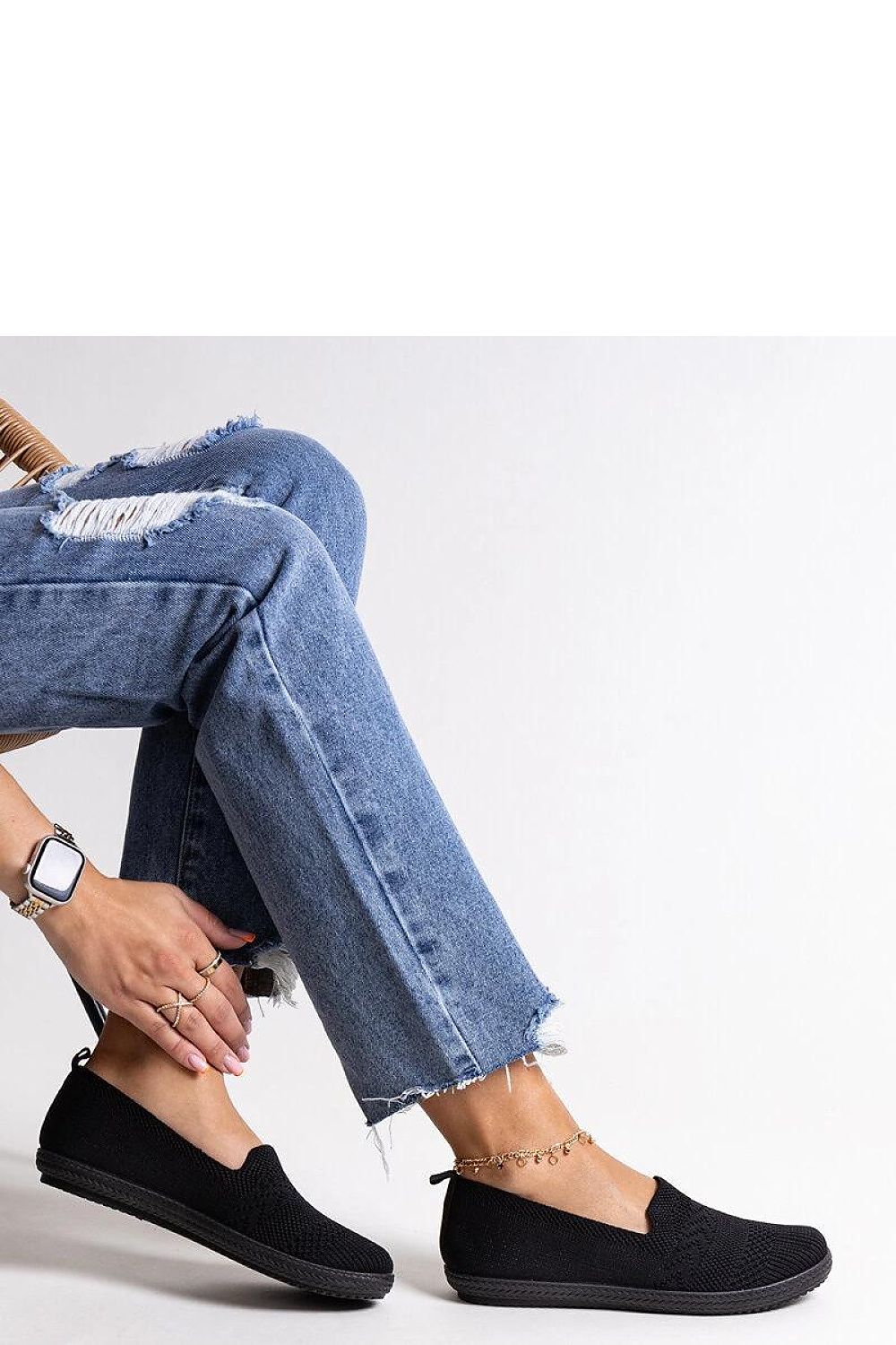 Elegant Solea black slip-on sneakers Shadhi for women, showcasing a contemporary design perfect for summer days.