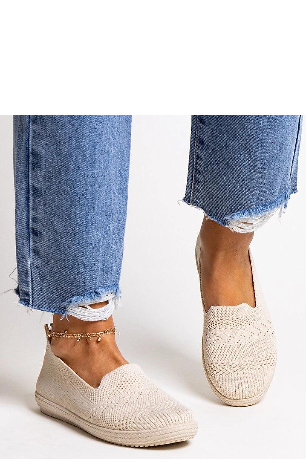 Elegant Solea black slip-on sneakers Shadhi for women, featuring a flexible fit and low cut for ultimate comfort during hot summer days.