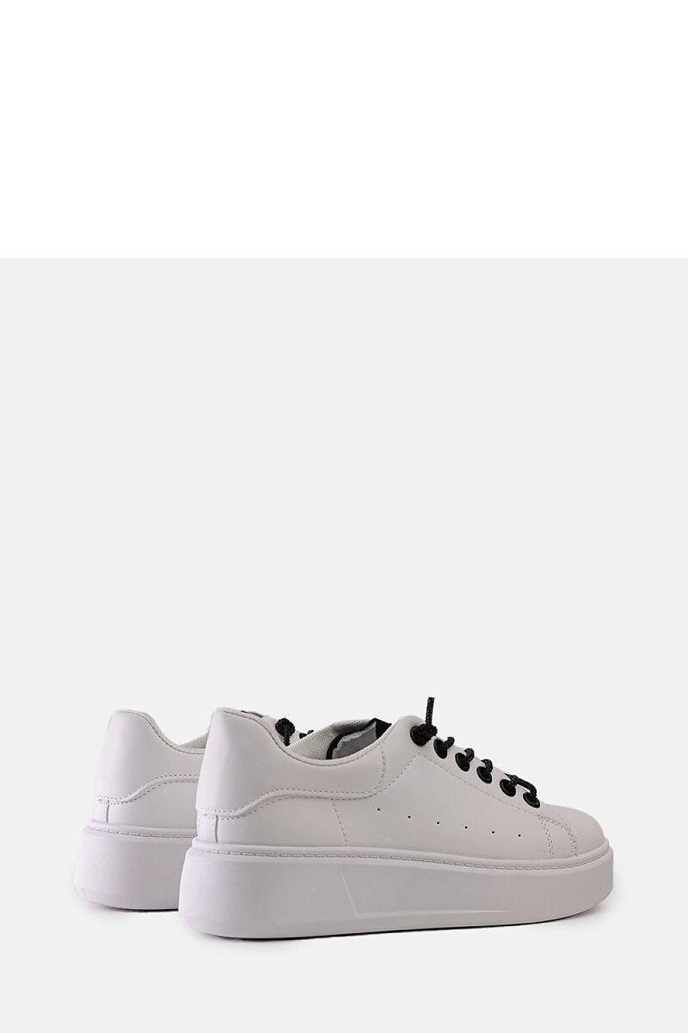 Chic Solea black sneakers with a 5cm medium heel, combining comfort and sophistication with sparkling zircon accents.