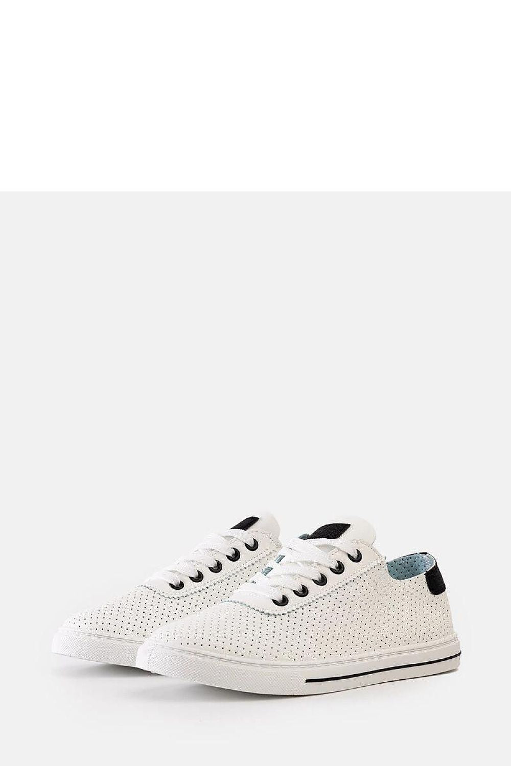 Trendy Solea White Ruala Sneakers designed for women, highlighting their lightweight comfort and sophisticated perforated details.