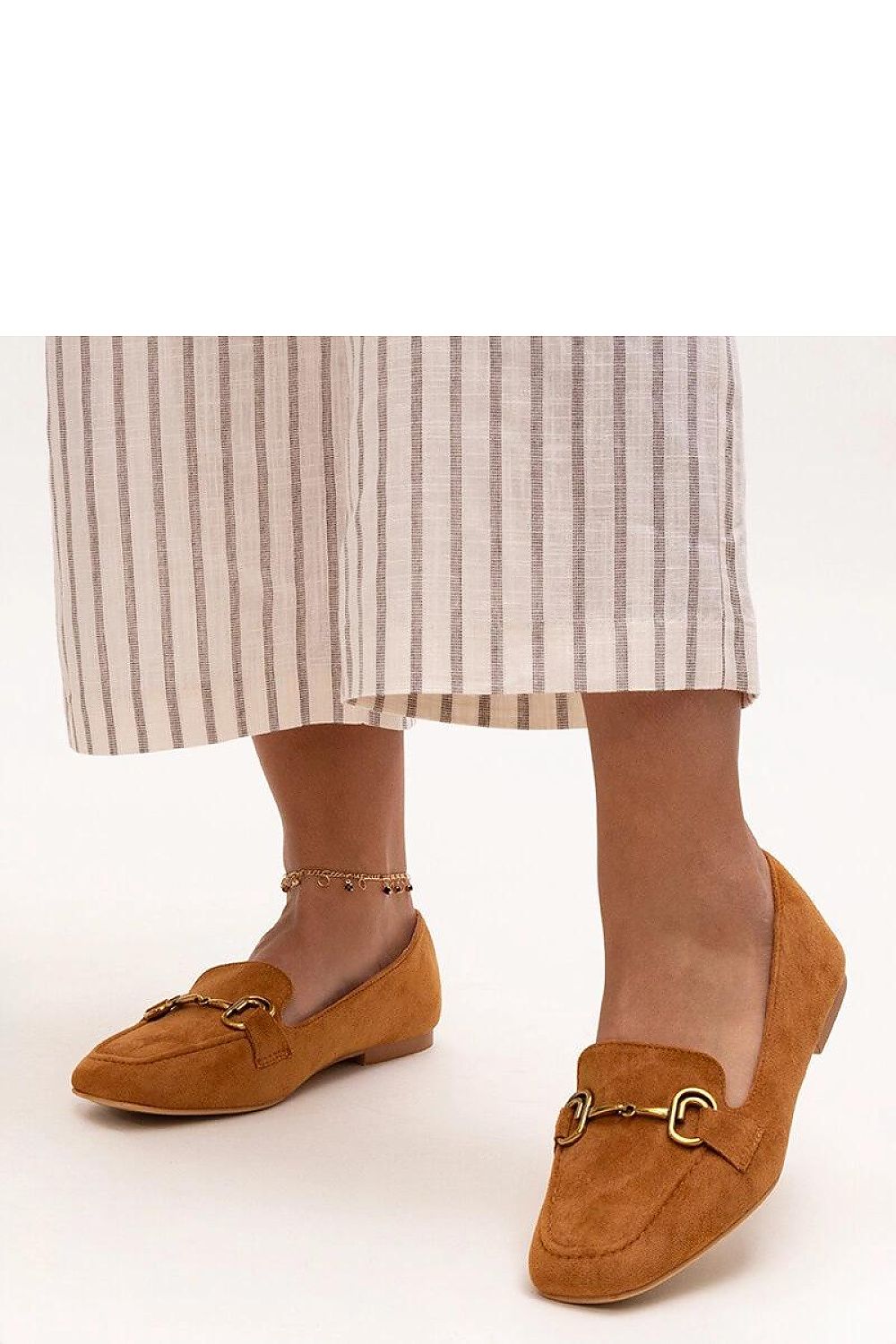Luxurious Solea brown Zamari moccasins with a sophisticated slip-on design, showcasing rounded toe seams and a beige synthetic sole, ideal for all-day comfort and style.