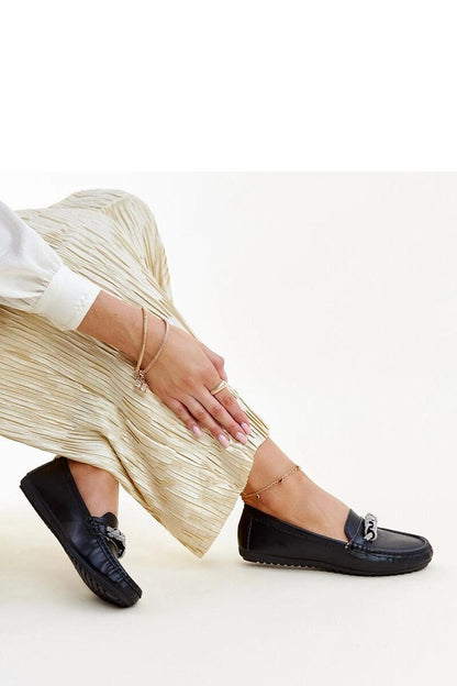 Close-up of Solea black moccasins with sparkling zircons, showcasing eco leather quality and sophisticated design.