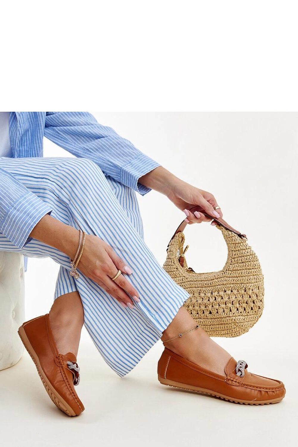 Stylish Solea moccasins with luxury zircon embellishments, perfect for adding sophistication to any outfit.