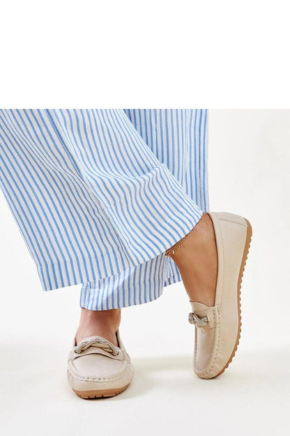 Luxurious Solea moccasins in black leather, featuring exquisite zircon details, designed to elevate any outfit with an elegant and contemporary touch.