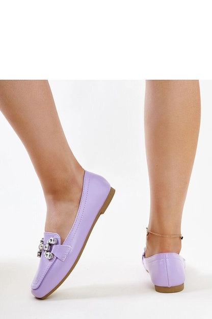 Close-up of Solea purple Mali moccasins with shimmering zircon buckle, highlighting sophistication and style.