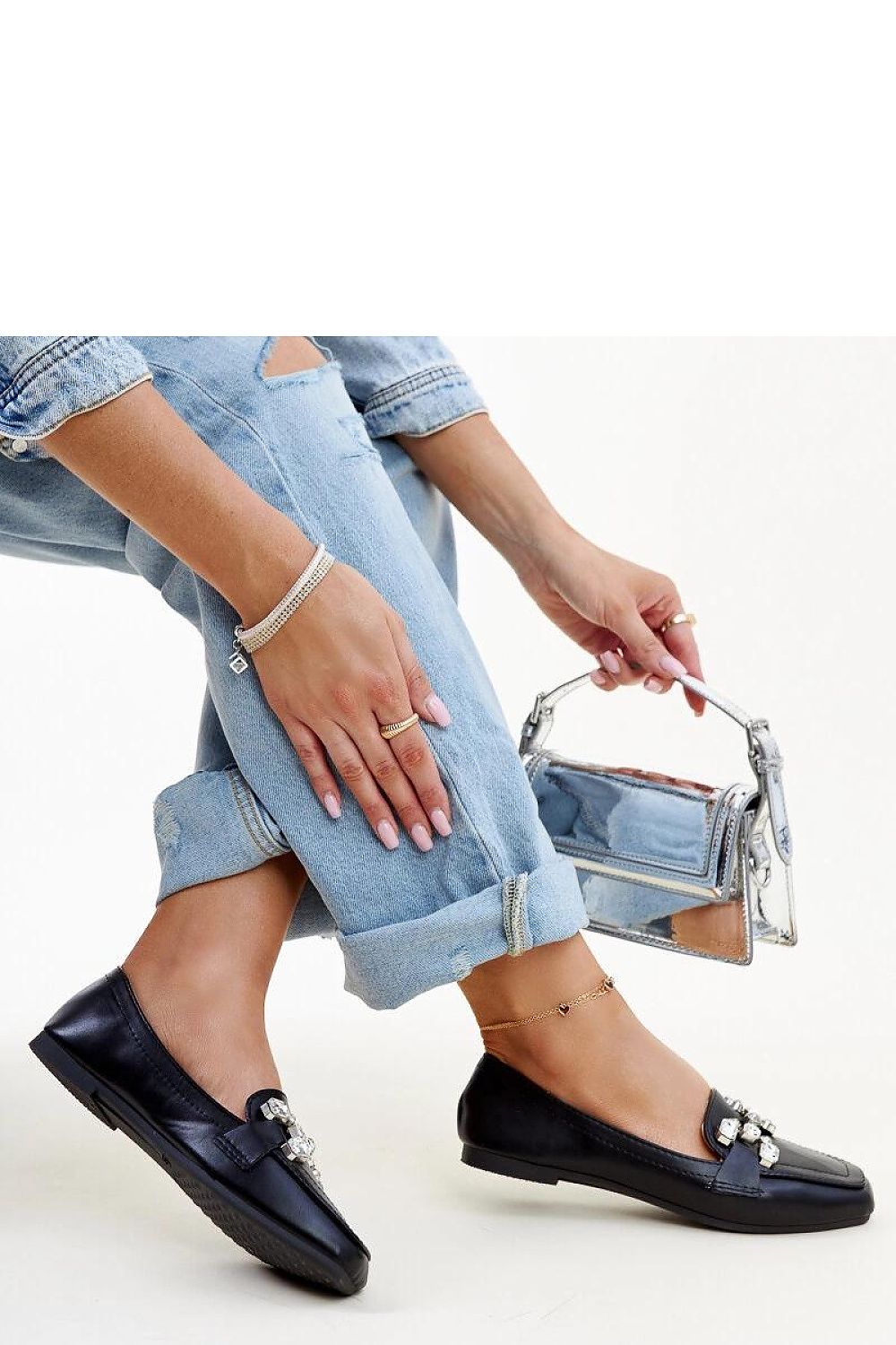 Chic Solea purple Mali moccasins paired with fashionable attire, perfect for elevating casual and formal looks.