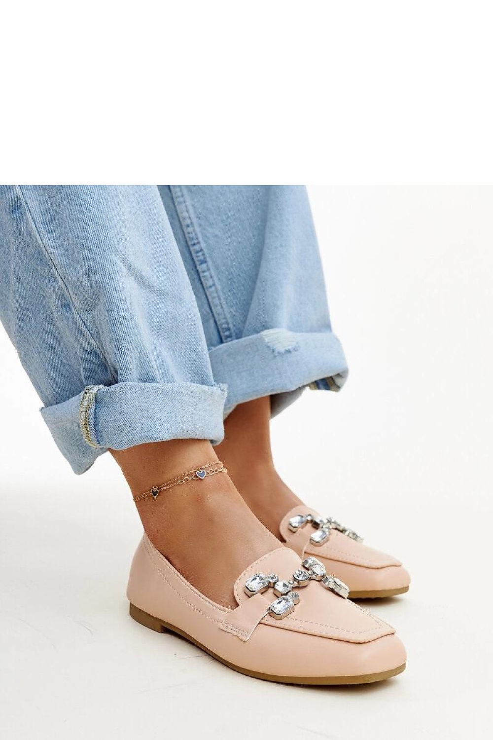 Solea Purple Mali Moccasins arranged elegantly, highlighting their unique design and versatility for various occasions.