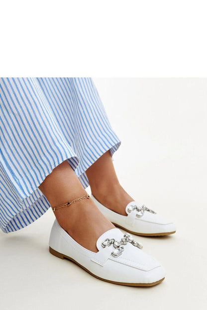 Stylish Solea Purple Mali Moccasins on a fashionable display, emphasizing the effortless slip-on design and vibrant purple hue.