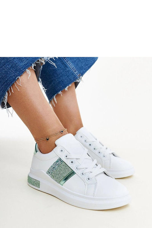 Solea Giulia sneakers showcasing eco leather craftsmanship, featuring a luxurious white and green design, perfect for sporty elegance.