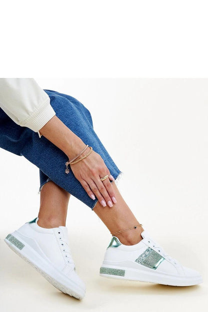 Close-up of Solea Giulia eco leather sneakers in white and green, highlighting the lace-up closure and rounded toe for ultimate comfort and trendy style.