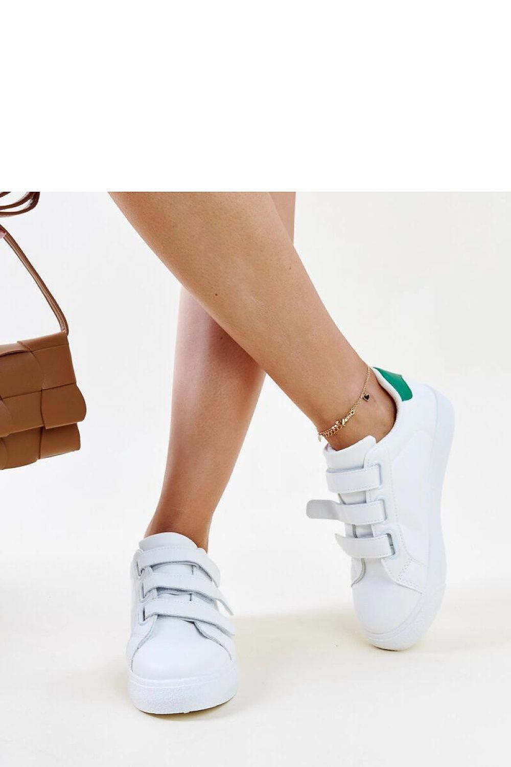 Solea eco-friendly white-green sneakers displayed, ideal for spring and summer, perfect blend of style and comfort for the discerning wearer.