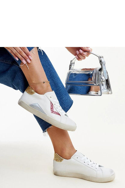 Side profile of Solea white sneakers with a worn look, perfect for streetwear enthusiasts seeking luxury in sustainable footwear.