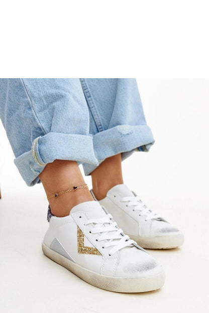 Solea luxury white sneakers featuring a worn effect, crafted from eco leather for trendsetters.