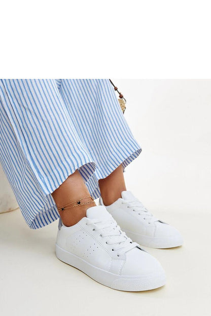 Detailed view of the Solea Akila Black and White Sneakers laced up, illustrating their comfort features and contemporary style for the modern woman.