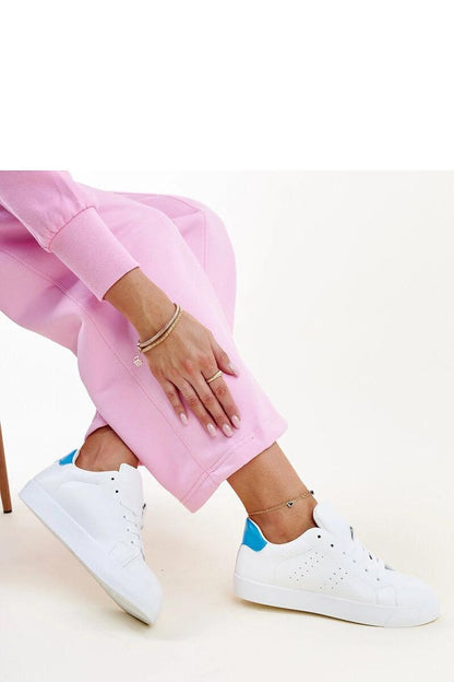 Chic Solea Akila Black and White Sneakers, featuring a laced closure, ideal for adding a touch of sophistication to casual outfits.