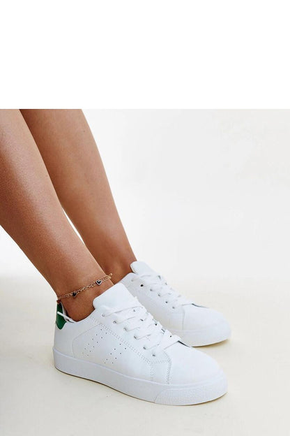 Chic Solea Akila black and white sneakers with a laced closure, ideal for fashionable everyday wear.