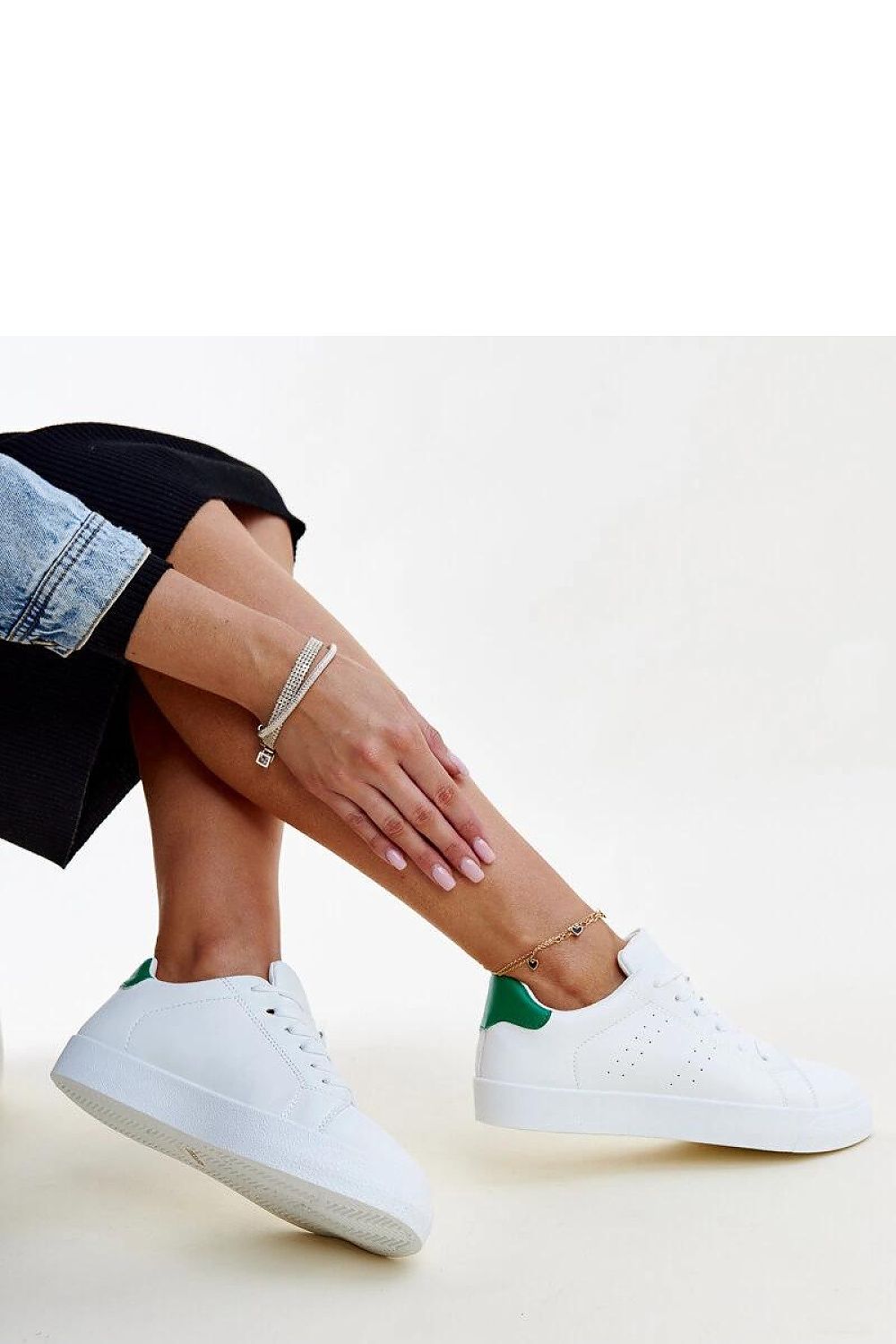 Fashion-forward Solea Akila sneakers featuring eco leather in black and white, a must-have for chic women.