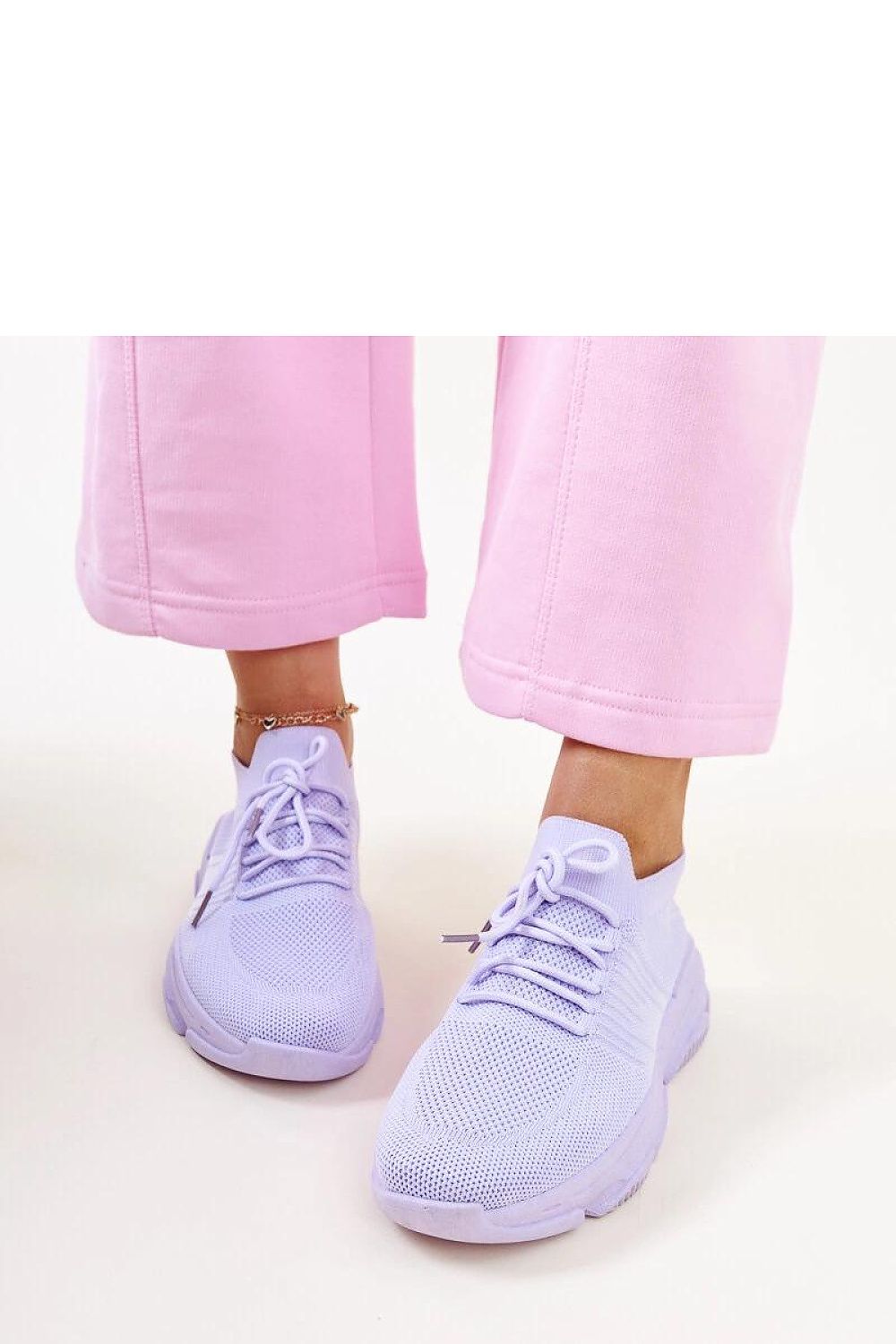 Solea Purple Sneakers for Women showcasing a stylish design with a 5.5cm rubber sole, rounded toe, and slip-on feature, perfect for modern luxury fashion.