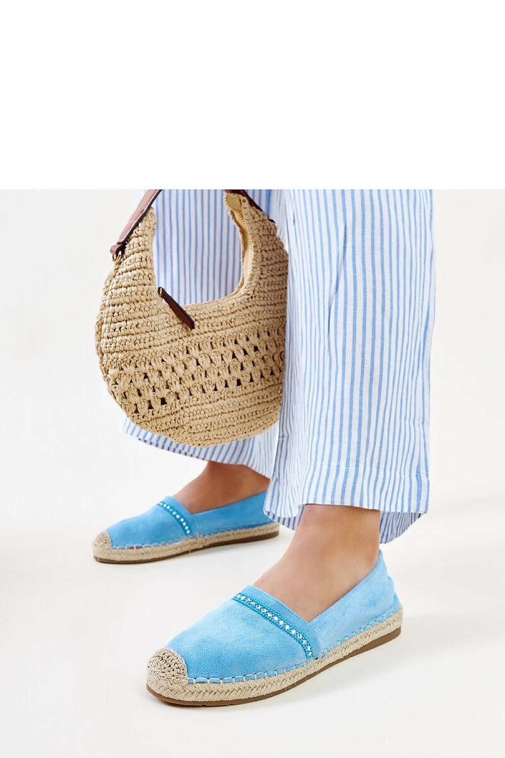 Elegant Solea blue espadrilles adorned with Abia zirconias, showcasing luxury summer footwear with slip-on comfort.