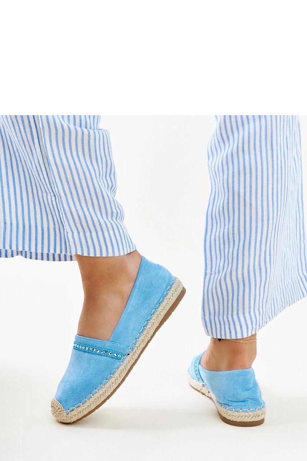 Solea blue espadrilles adorned with elegant zirconias, showcasing a slip-on design perfect for summer style and comfort.