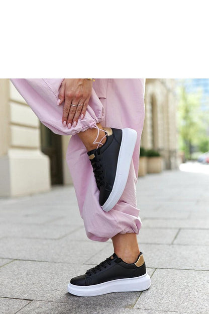 Stylish lace-up black sneakers from Solea, crafted from eco leather, combining sustainability with contemporary fashion.