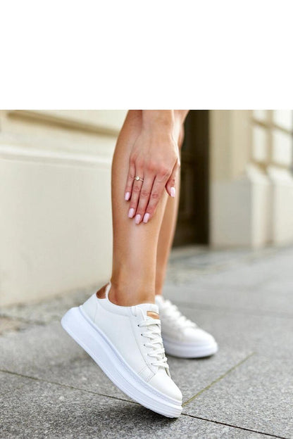 Elegant Solea Black Lace-Up Sneakers with rounded toe and durable design, ideal for discerning fashionistas.