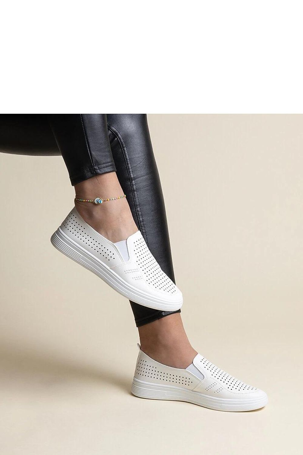 Solea White Slip-On Sneakers for Women, featuring a stylish eco leather design. Perfect for casual outfits in sizes EU 36-41.