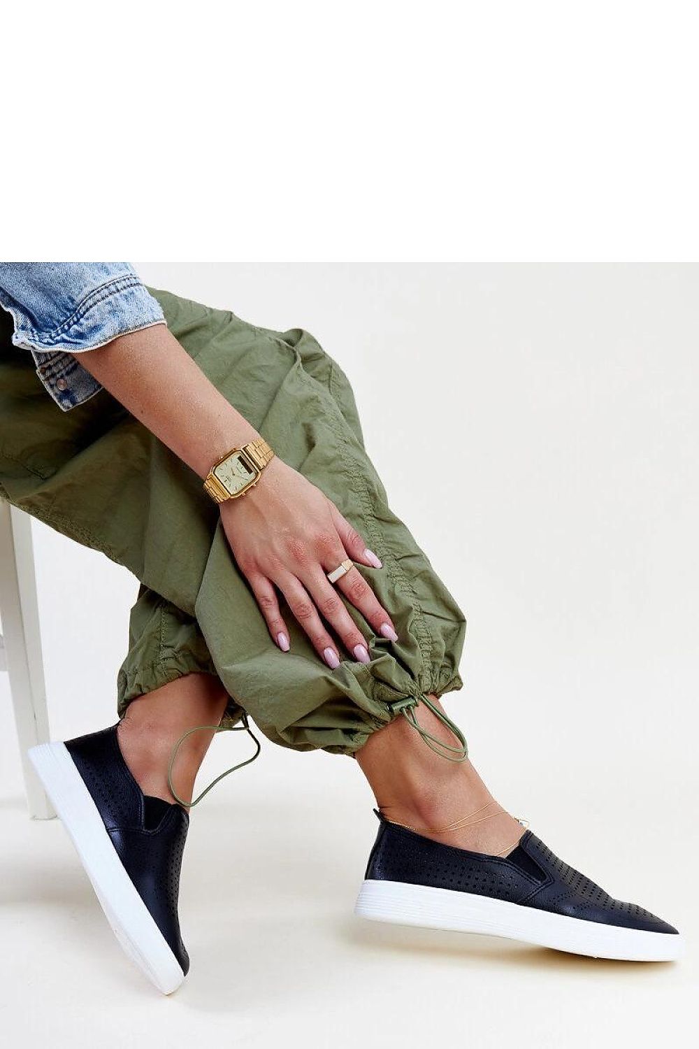 Elegant Solea white slip-on sneakers for women, showcasing eco leather craftsmanship and stylish design, perfect for casual spring and summer outfits.