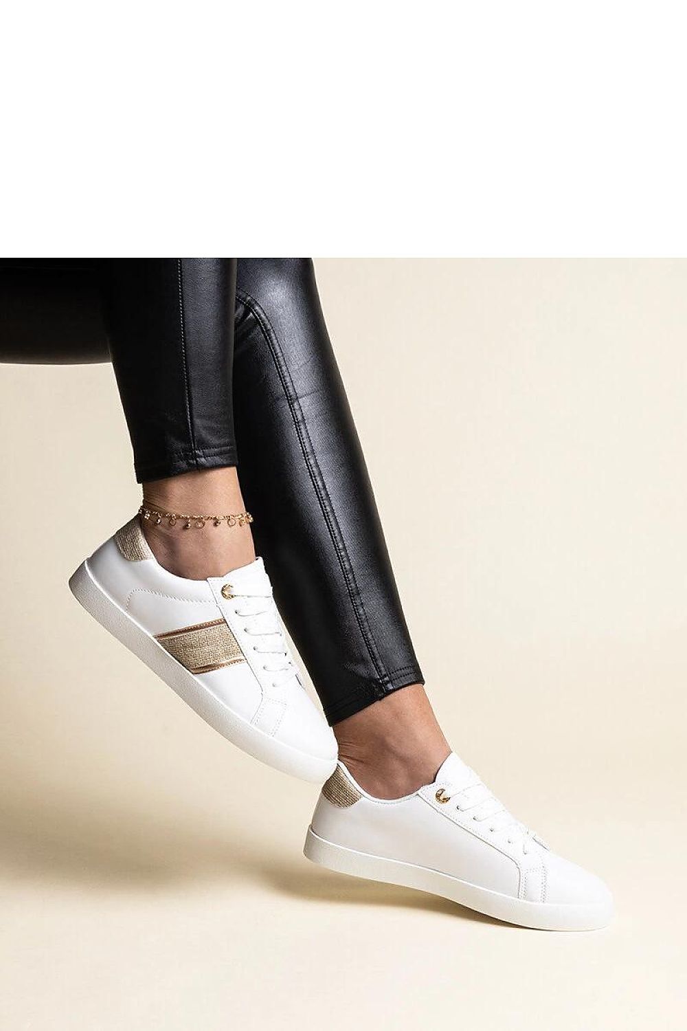 Solea White and Gold Sneakers for Women featuring a stylish low design with decorative strap and elegant zircons, perfect for modern fashion.