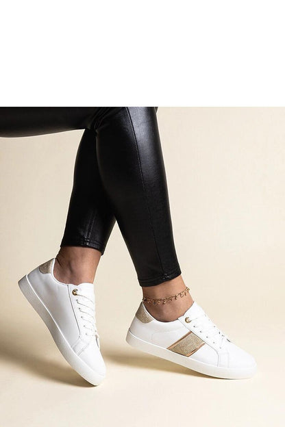 Close-up view of Solea Women's Sneakers showcasing luxurious white and gold synthetic suede leather and sophisticated detailing.