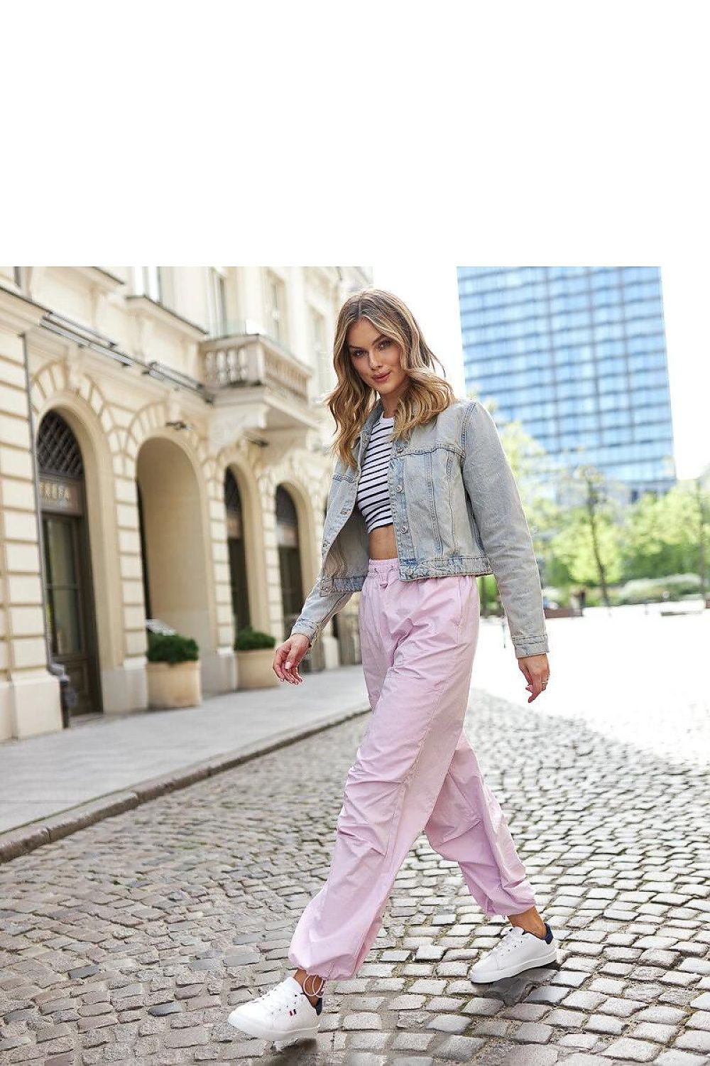 Elegant Solea White Eco-Leather Sneakers, featuring a low profile and rounded toe, offering a blend of comfort and sophistication.