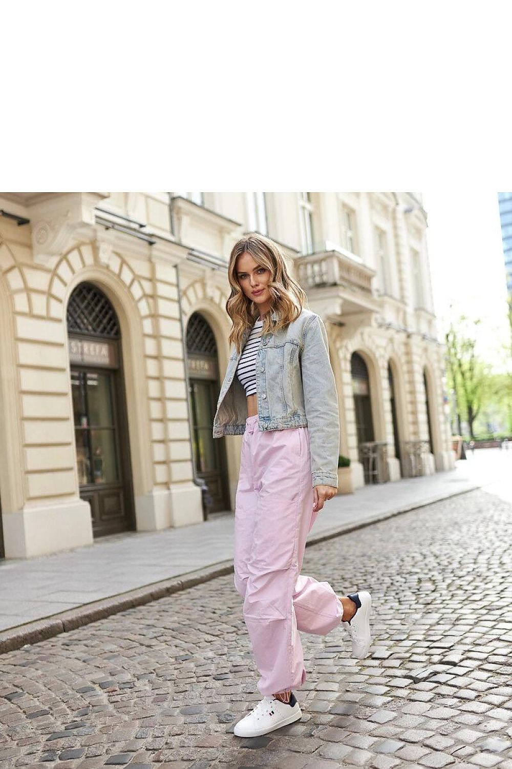 Chic Solea White Eco-Leather Sneakers with a durable rubber sole, ideal for fashionable women seeking both style and comfort.