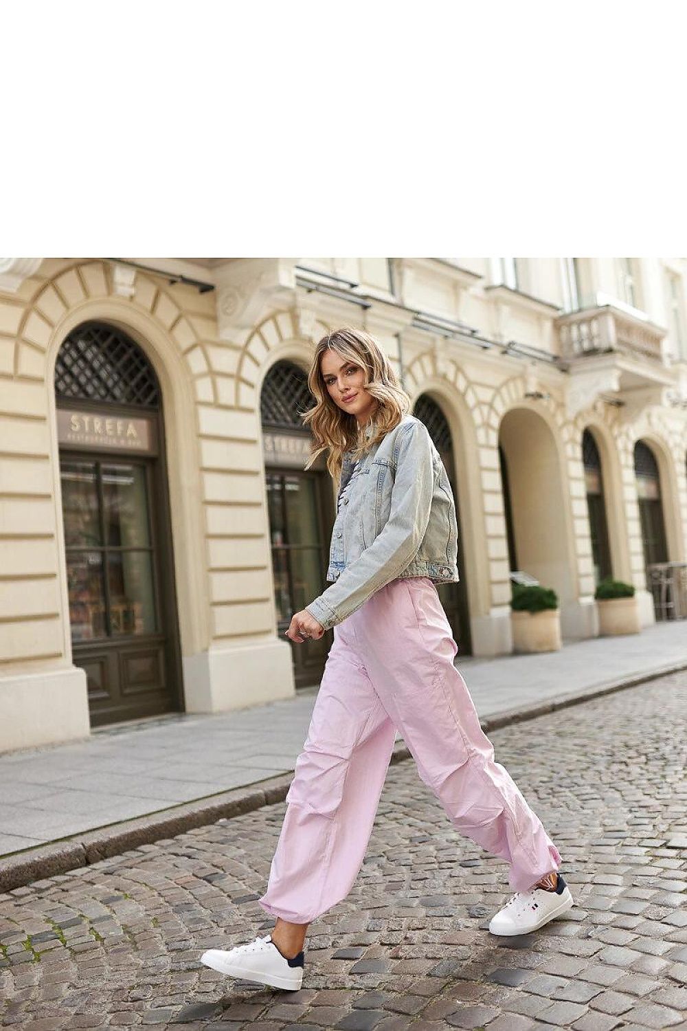 Fashion-forward Solea White Eco-Leather Sneakers, encapsulating modern streetwear with sustainability and luxury.