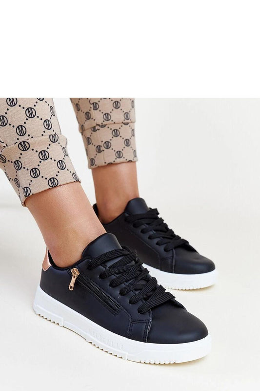 Solea Shanna Black Sneakers featuring eco-friendly leather with a stylish side zipper, perfect for modern footwear enthusiasts.