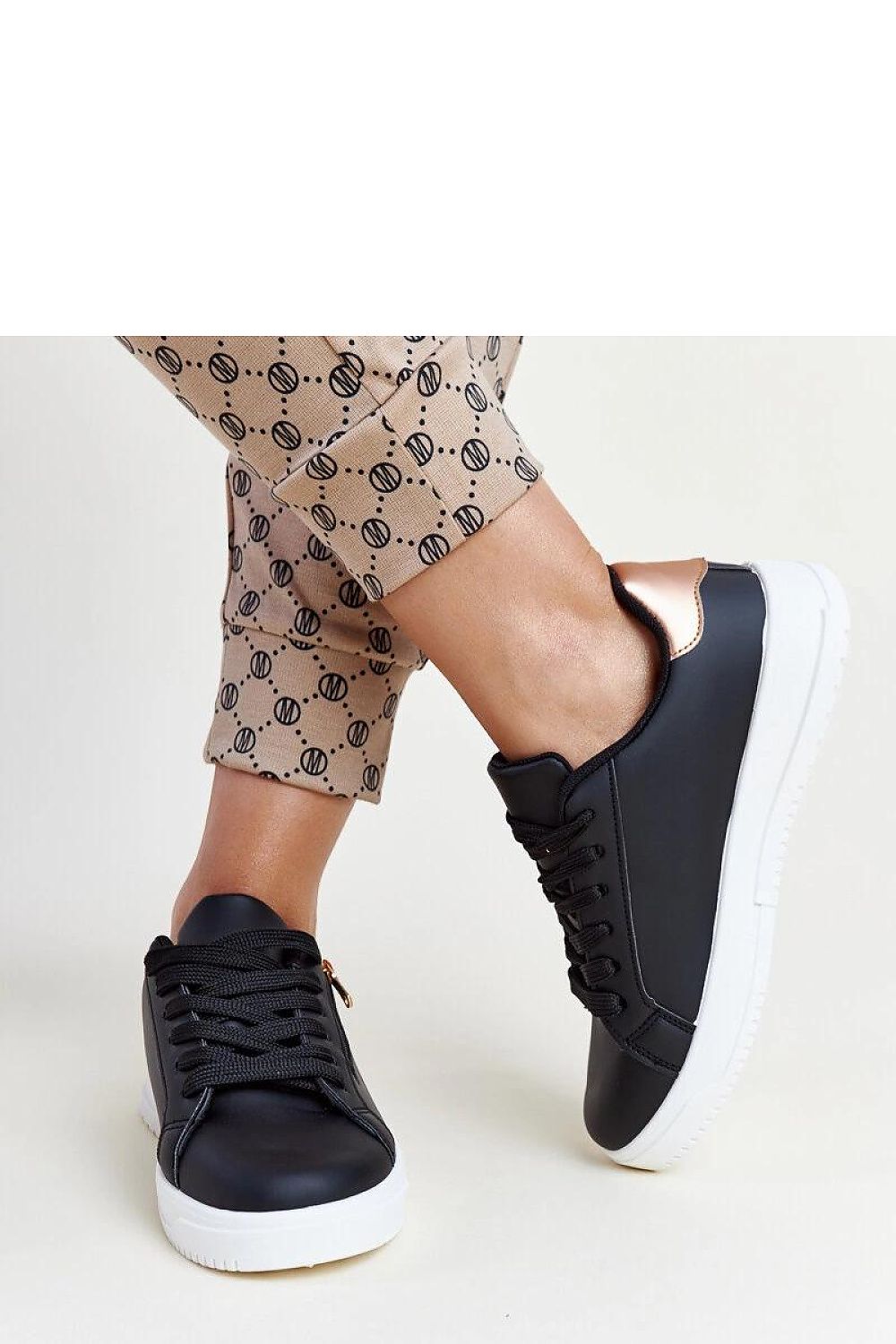 Solea Shanna Black Sneakers with a chic side zipper, embodying a luxurious blend of style and practicality, ideal for casual outfits.