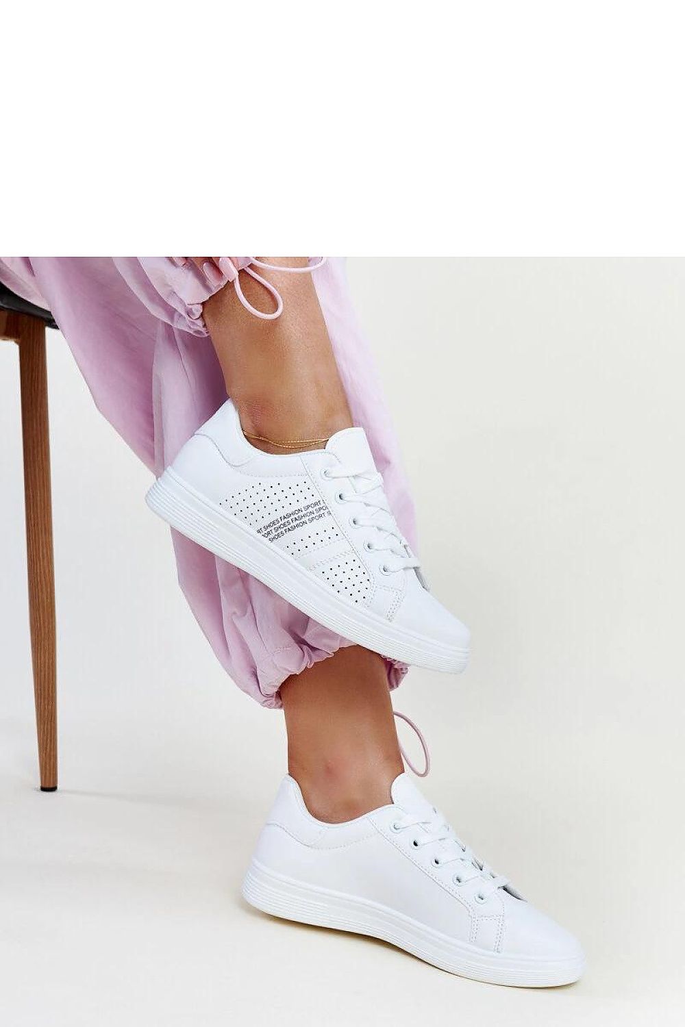 Close-up view of Solea's Eco-Leather White Berdine Sneakers, highlighting the innovative rounded toe and lacing for a refined fit.