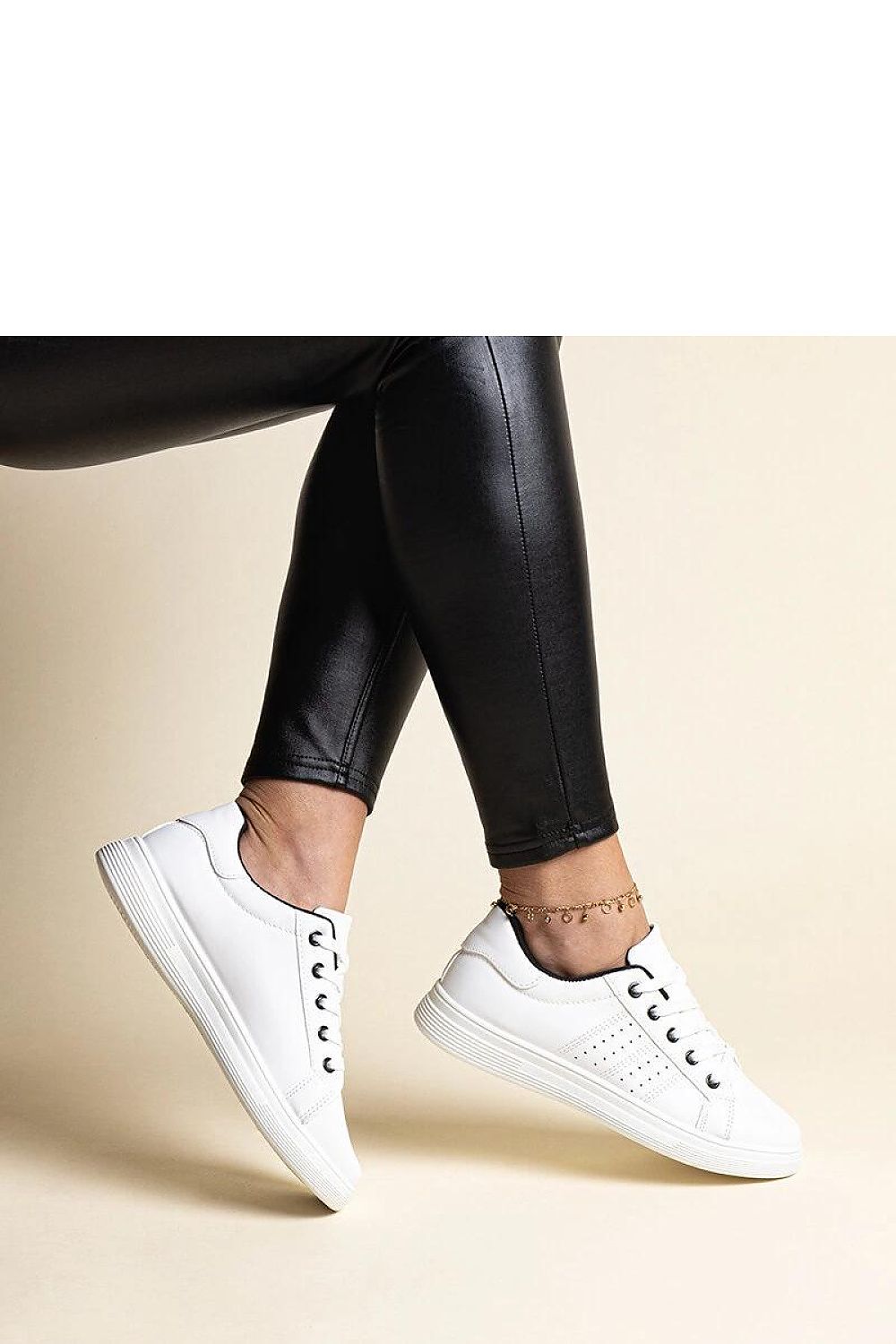 Solea White Eco Leather Sneakers displayed on a marble surface, emphasizing their elegant and comfortable design, ideal for modern luxury footwear.