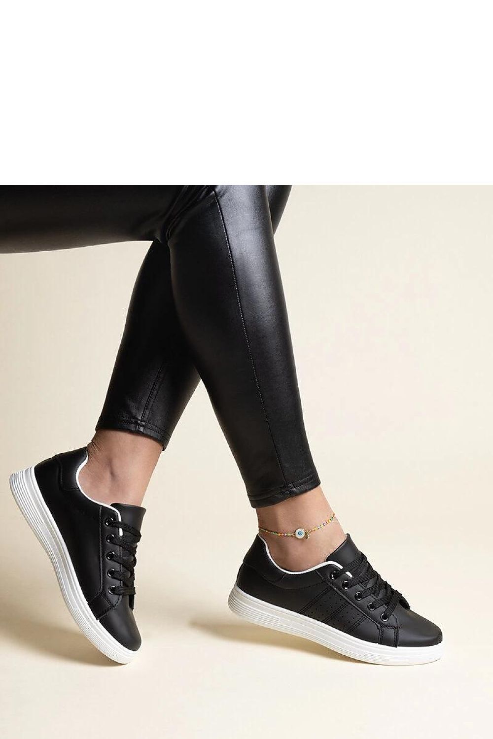 Top view of Solea White Eco Leather Sneakers, featuring polished eco leather finish and rubber soles, designed for ultimate comfort and style.